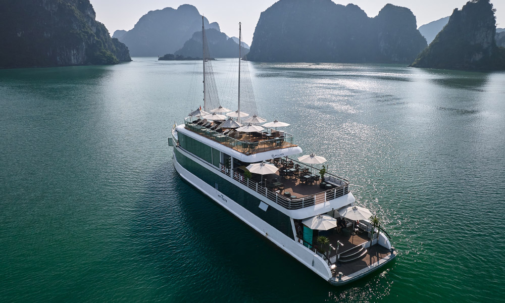 The Jade Sails Cruise going past Halong islands.