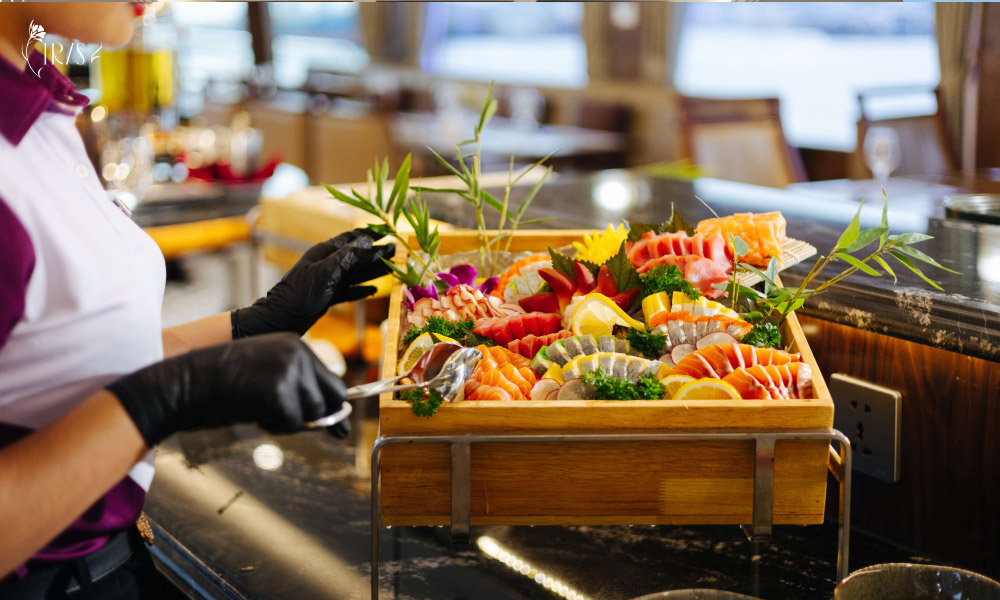 A tray of salmon cuts and seafood colorfully-decorated.