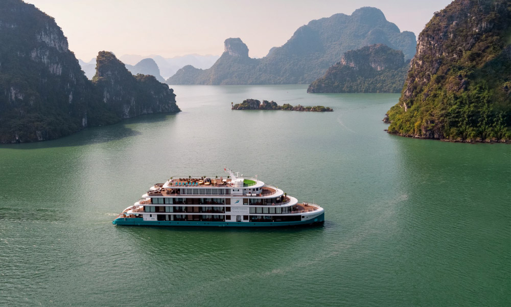 The Capella Cruise going in the middle of Halong Bay.