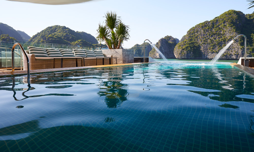 close up view of the pool with halong islands in the background