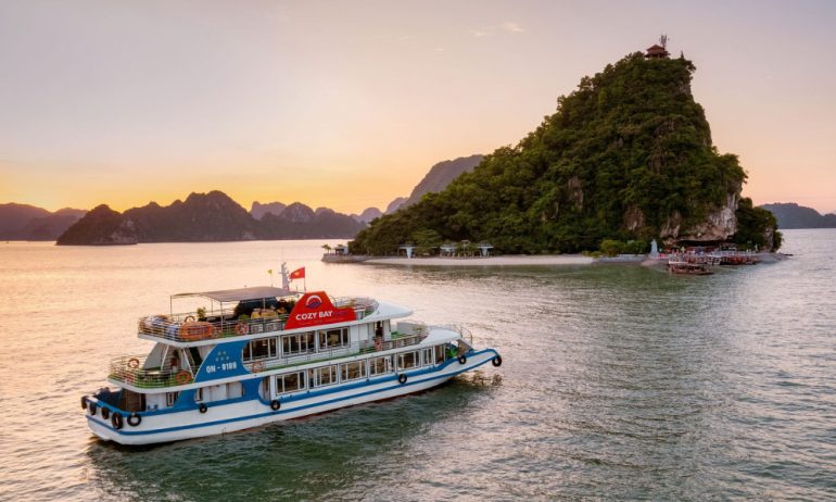 The Cozy Bay Cruises reaching Ti Top Island during sunset hour.