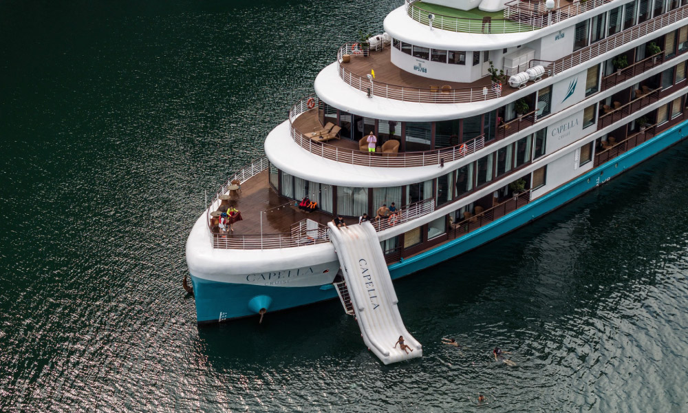 The deck and water slide of the Capella Cruise looking from above.