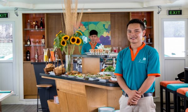 Two staff of Halong Bay Emeraude Min Cruise.