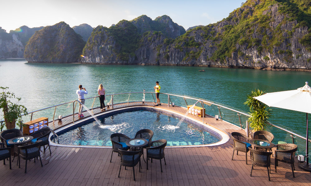 the pool on the deck of stellar of the seas cruise facing halong bay islands