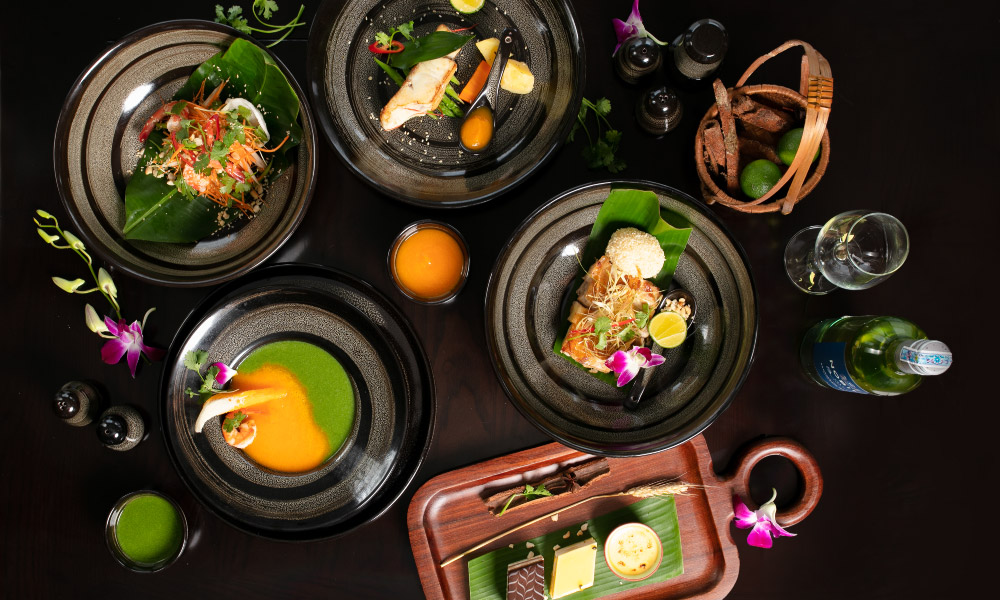 a table full of seafood dishes