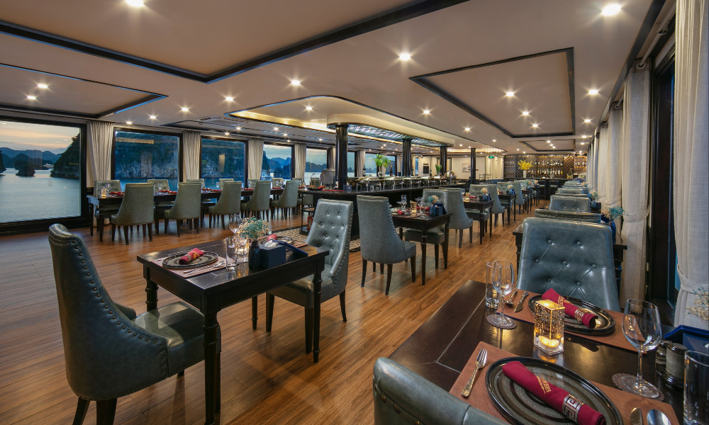 luxury restaurant on hermes cruise with grey chairs and lighting