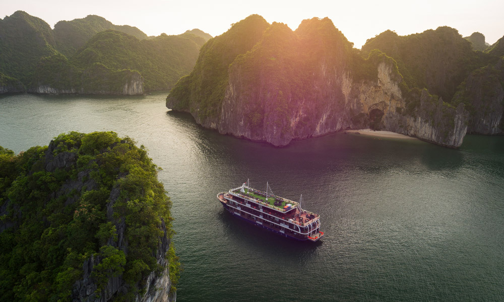 la pandora cruise among halong islands during sunset