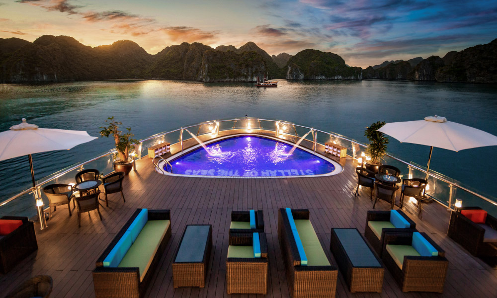 the pool of stellar cruise with view of halong bay nighttime