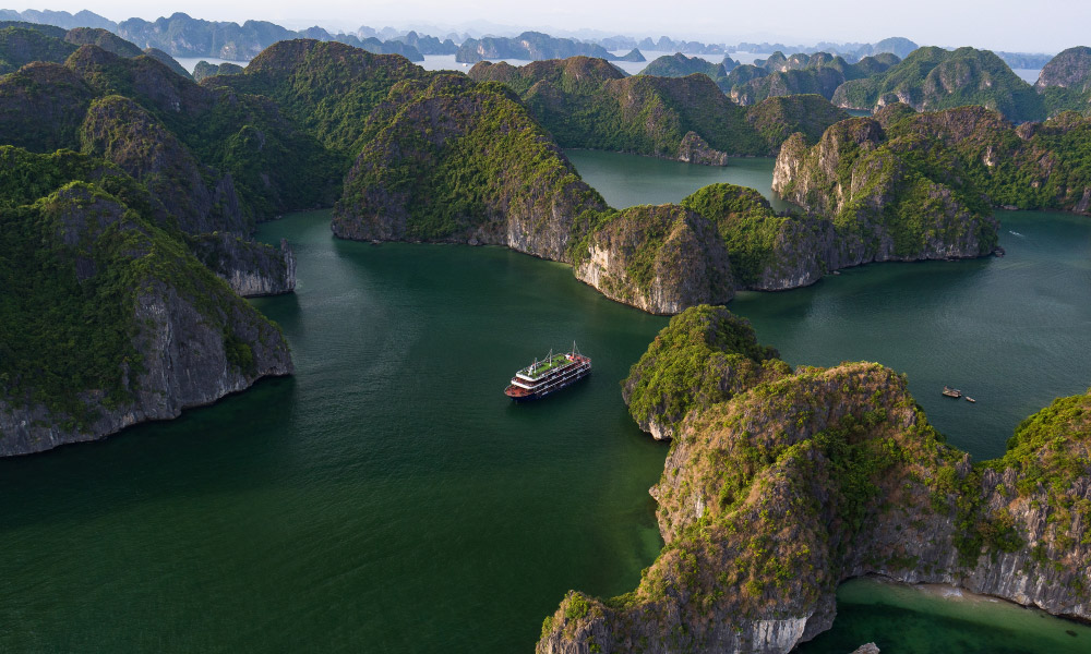 panorama of halong islands surrounding la pandora cruise