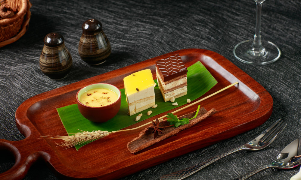 a plate of small cakes and sweets