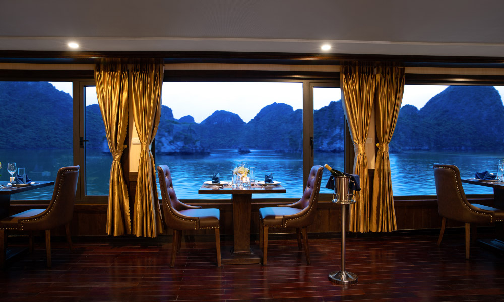 halong bay islands through the glass windows of a restaurant