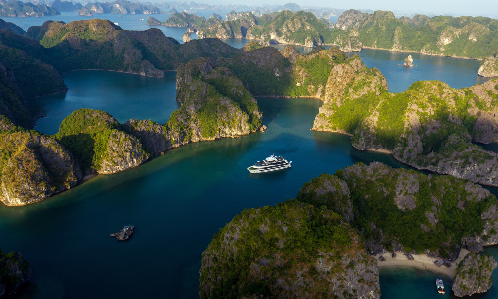 halong islands panorama with stellar cruise in the middle