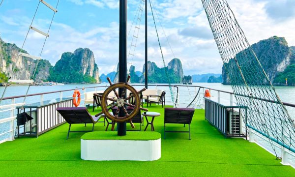 The sundeck of Phoenix Day Cruiser looking out to Halong islands.