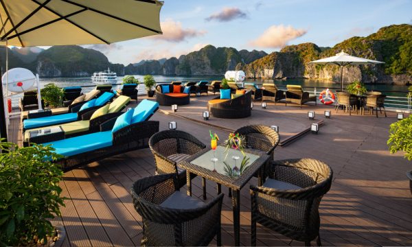 the sundeck on stellar cruise with lounge chairs and table