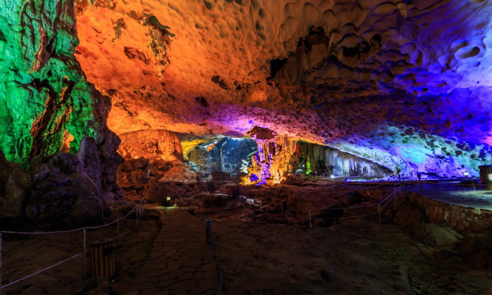 Sung Sot Cave with colorful lights.