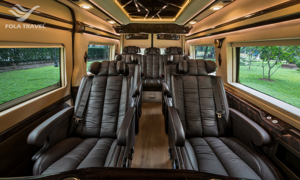 Inside a limousine with four leather seats.