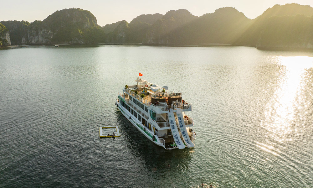 the serenity explorer cruise going through the bay during sunset