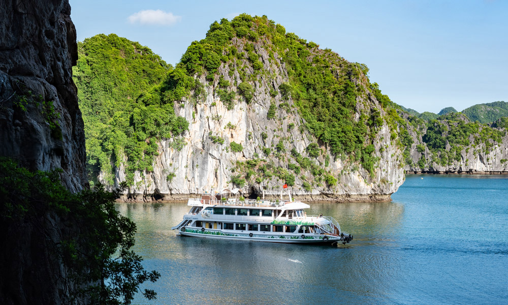 the serenity explorer cruise passing by islands in halong bay