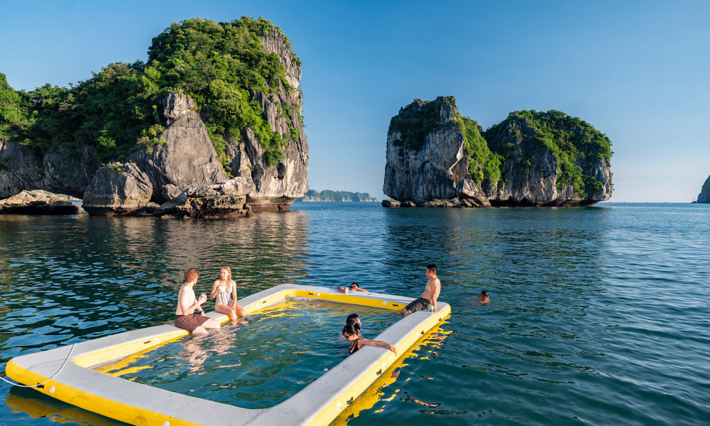 swimming in halong with a big inflatable float