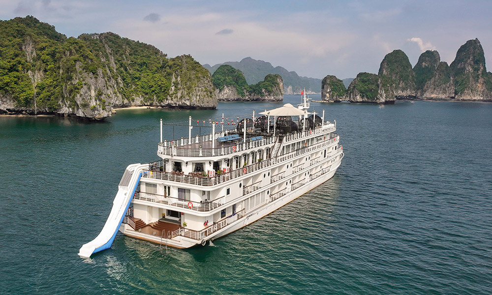 Behind view of the Ambassador Signature Cruise with a floating slide at the back.