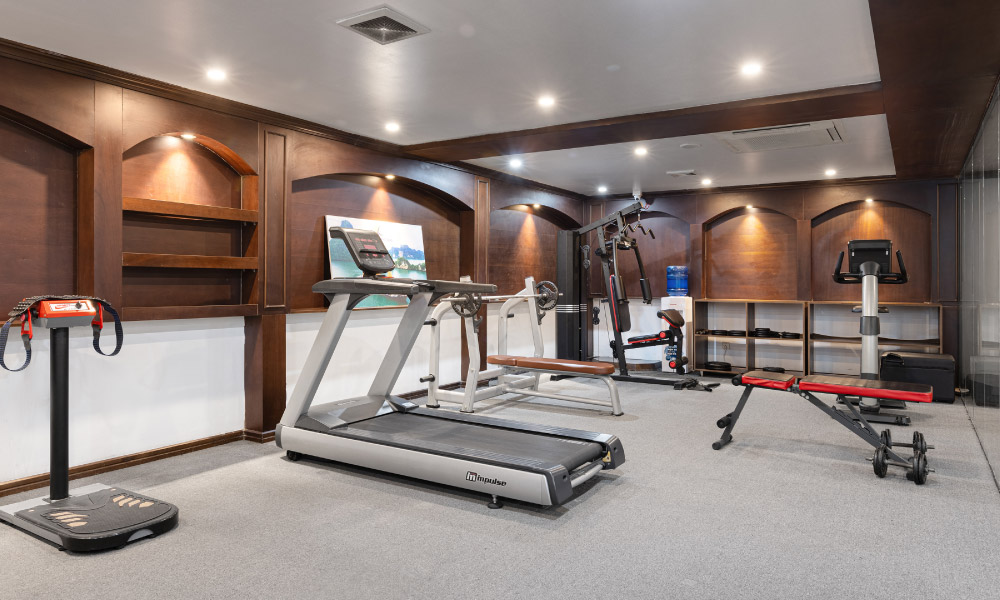 a gym room with modern running machines