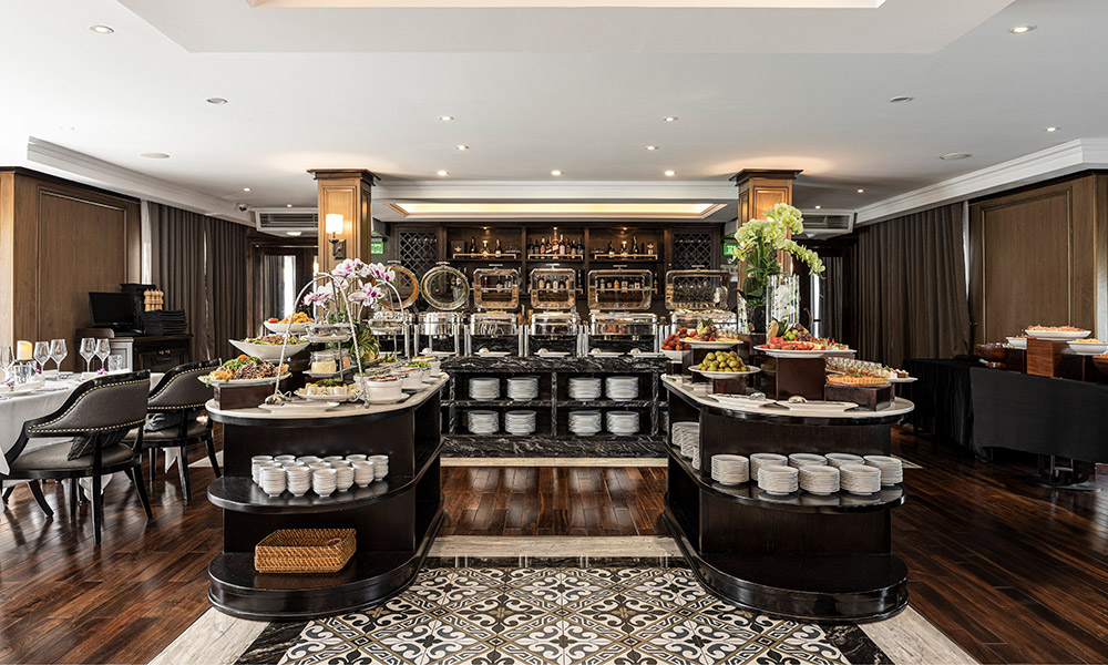 The bar and buffet stations on Ambassador Signature Cruise.