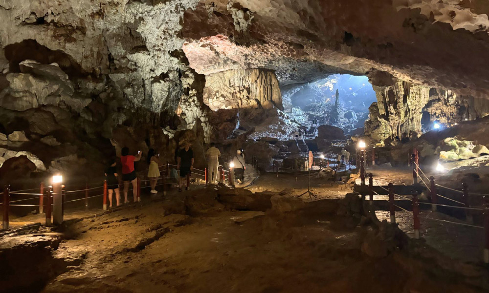 Guests visiting a cave in Halong Bay.