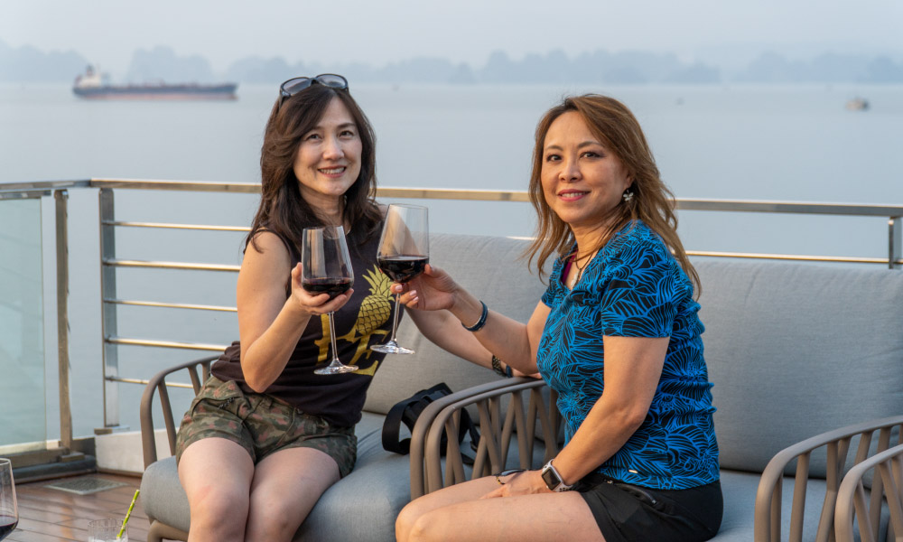 Guests enjoy drinks on the sundeck