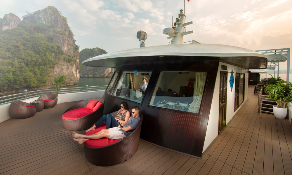 The bar and lounge space on the deck of a Halong Bay cruise.