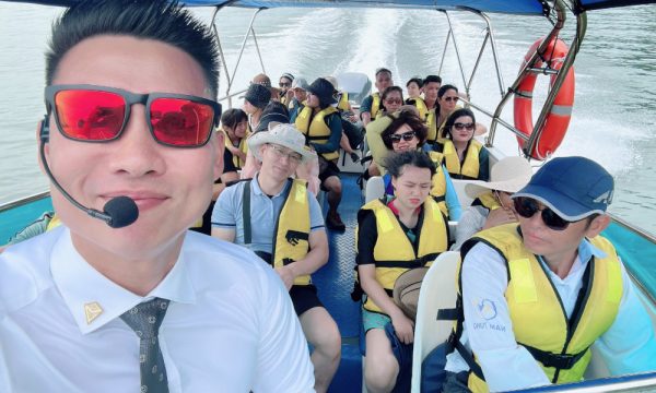 guests of halong symphony cruise on a tender boat