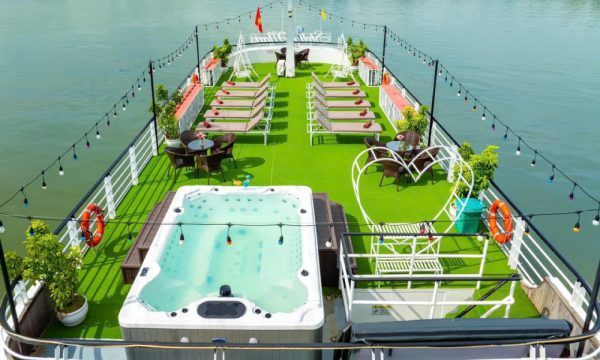 The sundeck of Hercules Luxury Cruise with lounge chairs and a jacuzzi looking from above.