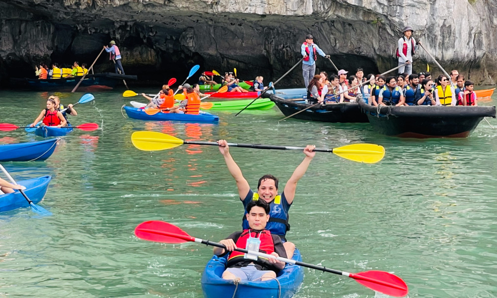 Hercules Luxury guests enjoy kayaking and bamboo boat activity.