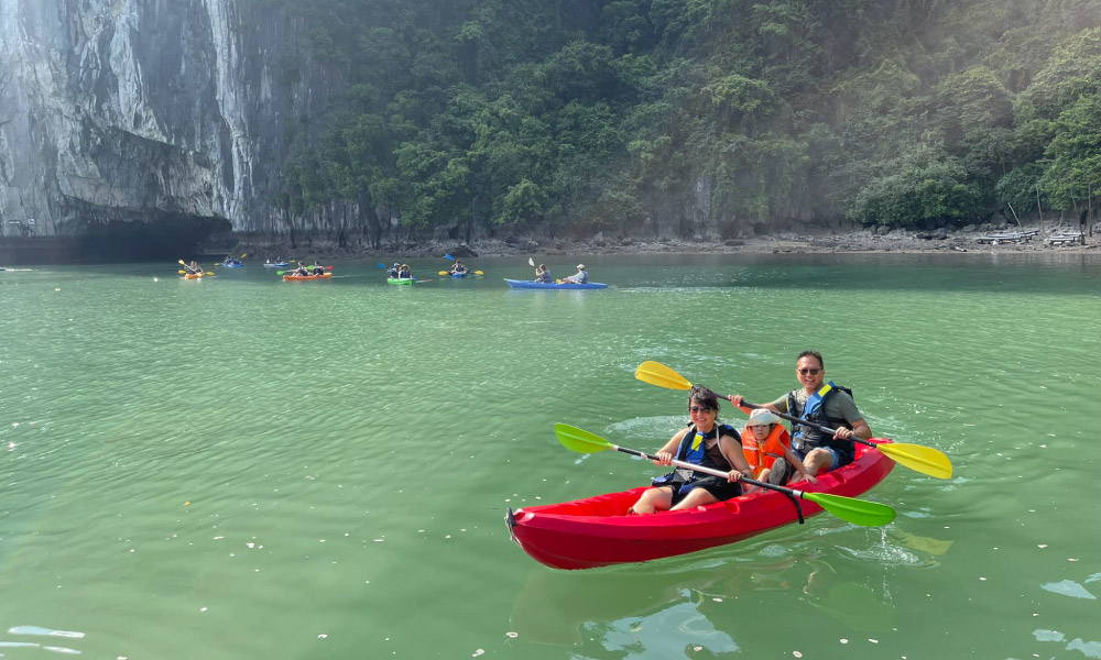 guests of lily luxury on a kayak