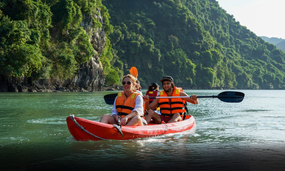 a couple enjoying kayaking activity