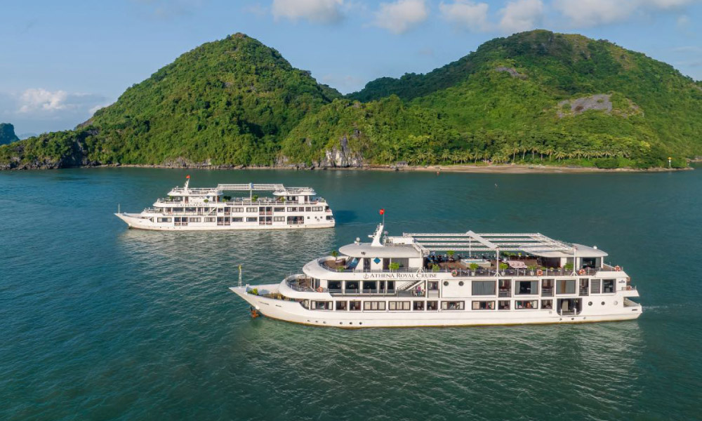 Two athena cruises in the middle of the bay.