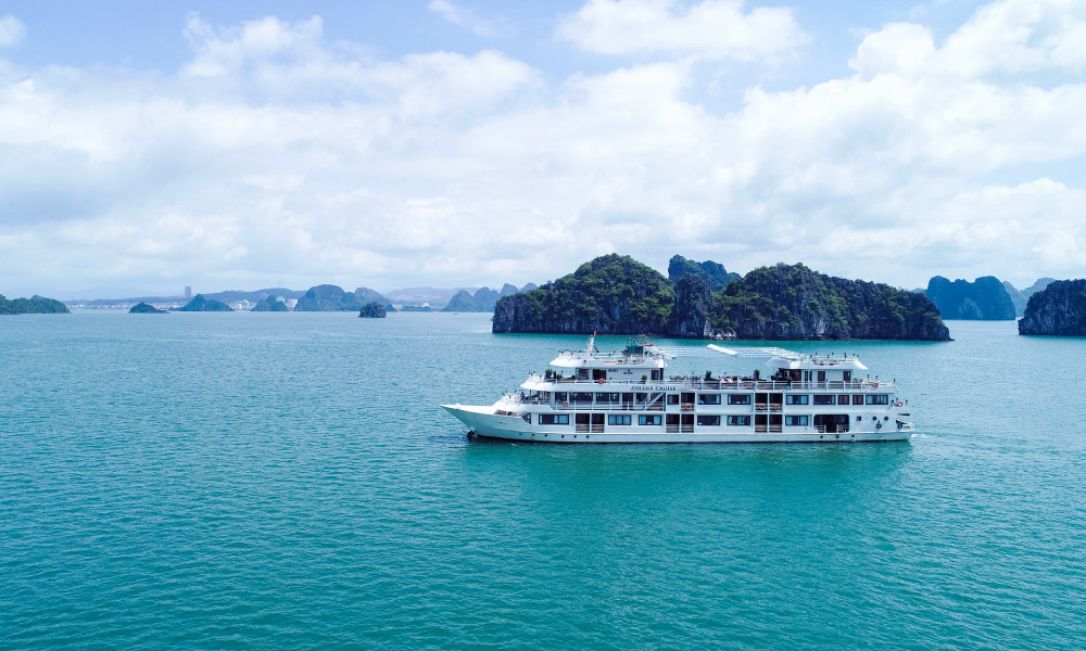 The Athena luxury cruise sailing in the bay.