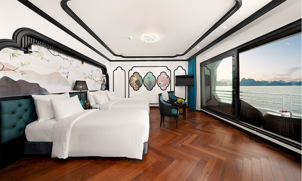 Overview of Catherine Premier first floor room with two beds and a balcony.