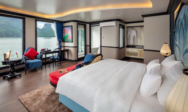 The verdure lotus luxury cruise with Halong Bay islands behind.