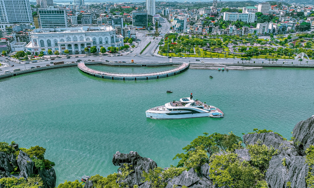 the saquila yacht cruising in the middle of halong city and islands