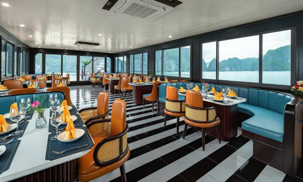 serenity premium restaurant with big windows looking out to halong bay