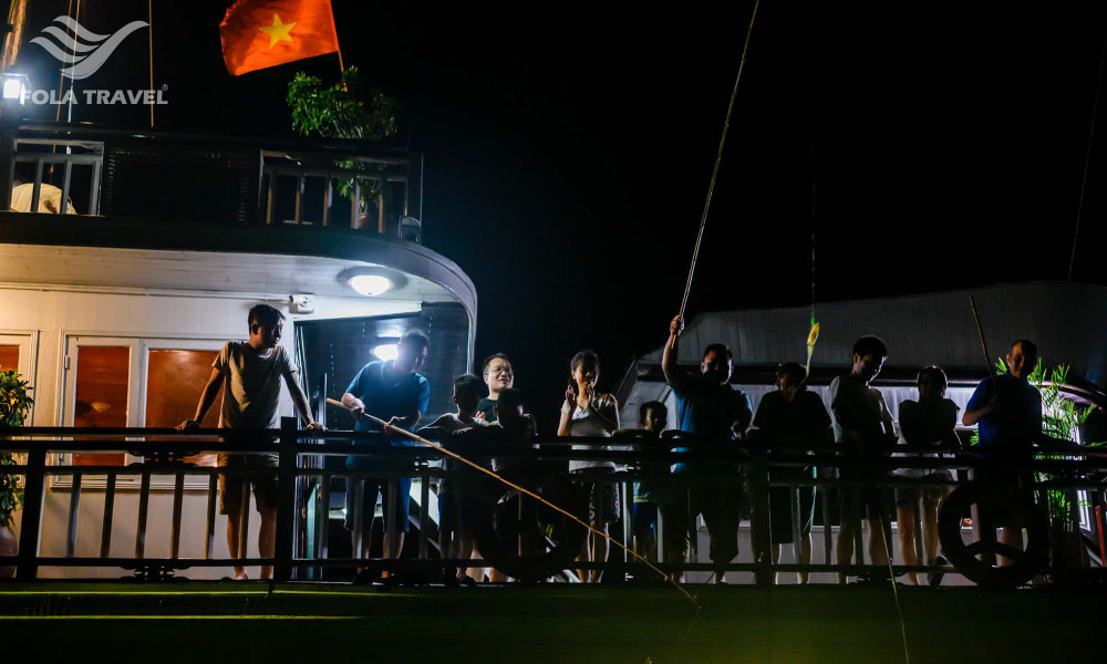 Night squid fishing activity on Halong Bay Cruises.