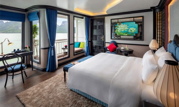 The verdure lotus luxury cruise with Halong Bay islands behind.