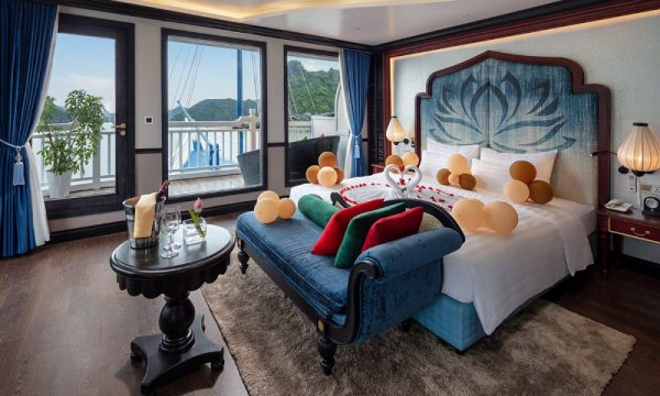 The verdure lotus luxury cruise with Halong Bay islands behind.