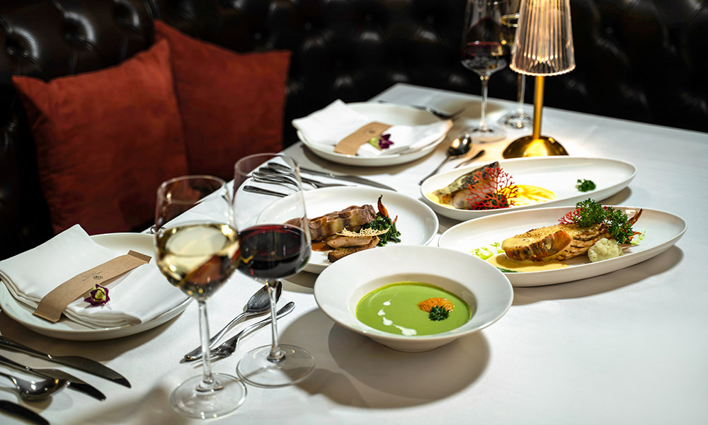 A table full of western dishes plate nicely.