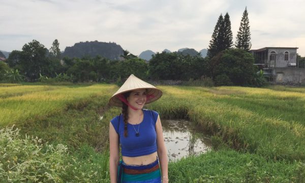 A girl in the middle of Ninh Binh countryside.