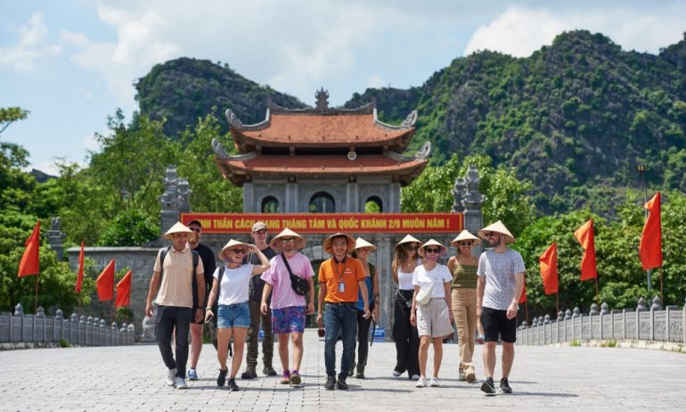 Ninh Binh tourists at the gate of Hoa Lu ancient capital.