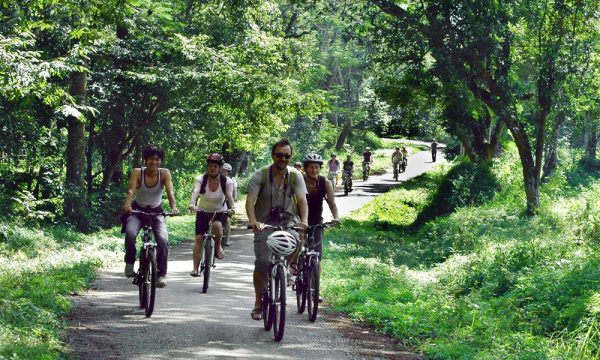 People cycling in cuc phuong national park ninh binh.