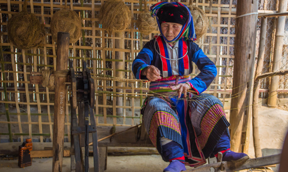 Ethnic women weaving brocade in Lung Tam village.