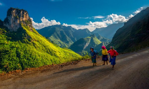 Woman on a trail among Ha Giang mountain.