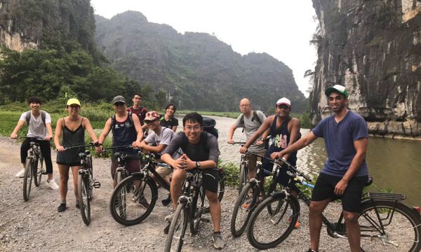 A group of friends on bicycle in Trang An.